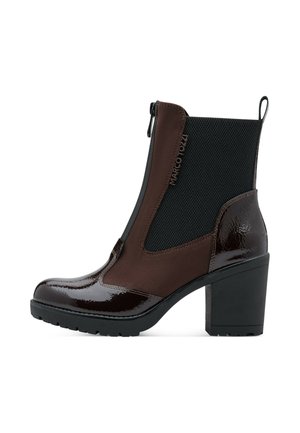 Dark brown ankle boot with black elastic side panels, chunky block heel, front zipper, and textured sole.