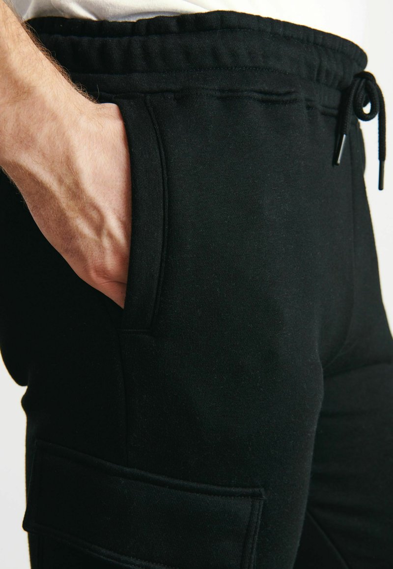 Next STANDARD Tracksuit bottoms black Zalando.de