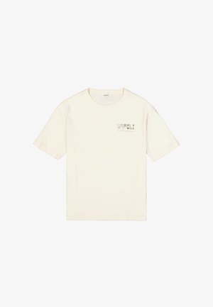 T-shirt à manches courtes de couleur crème en coton. Présente un petit logo "NAPOLI" en texte sombre sur la poitrine à gauche.