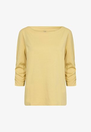 Gelbes, langärmeliges Oberteil mit weitem U-Boot-Ausschnitt und gerafften Details an den Ärmeln, aus weichem, leichtem Stoff. Glatte Textur.