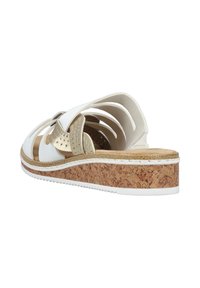 White and gold sandals with cork wedge sole, featuring cut-out design and perforated accents for breathability. Side view displayed.