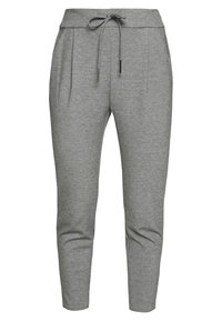 Grijze sweatpants met een trekkoord in de taille, taps toelopende pijpen en twee voorplooien. Gemaakt van zacht, textuurachtig materiaal voor comfort.