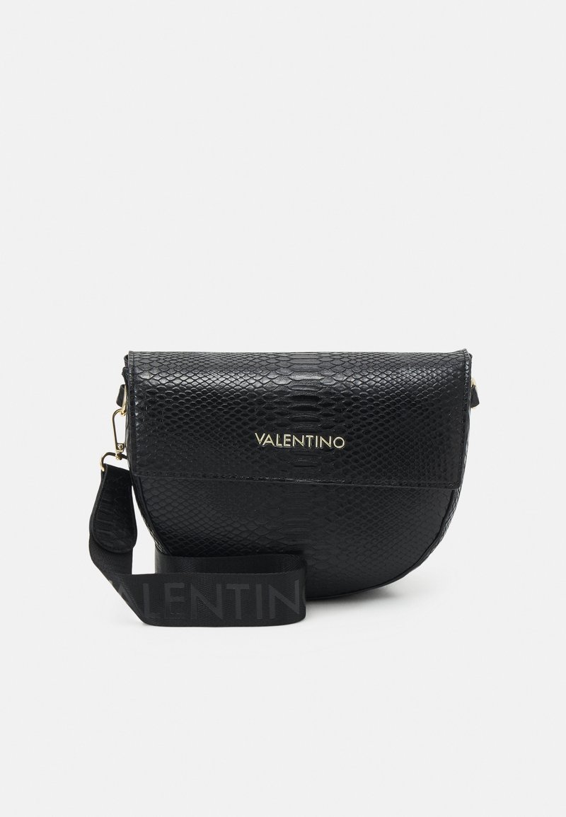 Black snake-effect leather crossbody bag with gold logo detailing. Features a curved shape and a contrasting black strap with branding.