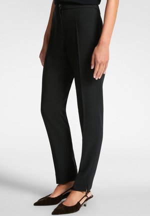 SLIM IN STRETCH - Pantaloni - nero