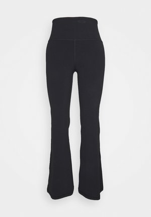 Leggings évasés noirs avec une ceinture large, en tissu extensible. Présentent des coutures minimales et une texture lisse.