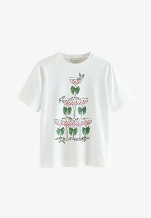 T-shirt en coton blanc avec un design illustré de verres empilés ornés de nœuds roses et de feuilles vertes. Manches courtes, col rond.
