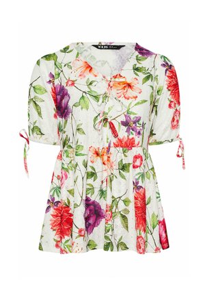 Hvid kortærmet bluse med farverigt blomsterprint, V-hals bundet med snore og puffede ærmer samlet med små sløjfer.