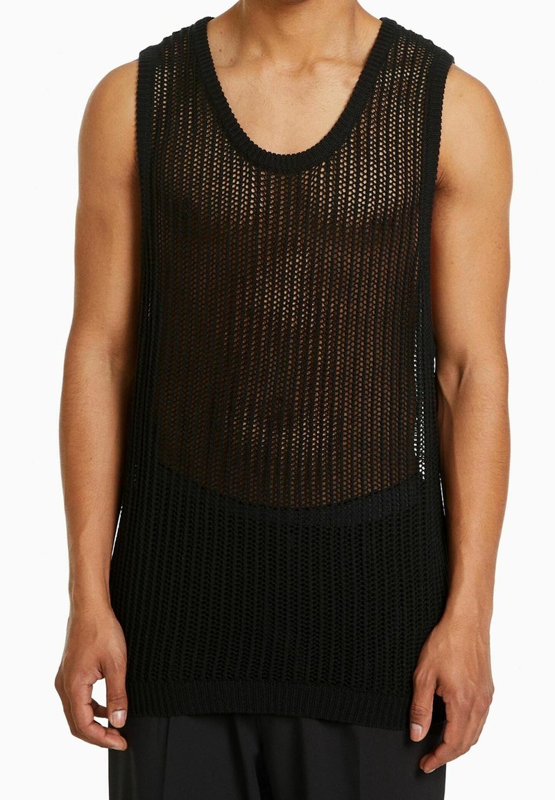 Black sleeveless knit tank top with a loose, textured weave and a wide round neckline. Features ribbed hem and shoulder seams.