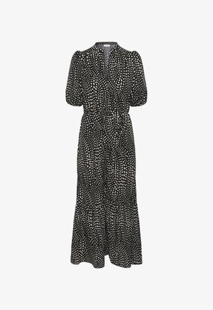 Mustast musta kleit valgete ebaühtlaste täppidega, volangvarrukatega, V-kaelusega, elastse vööga ja volangilise äärega.