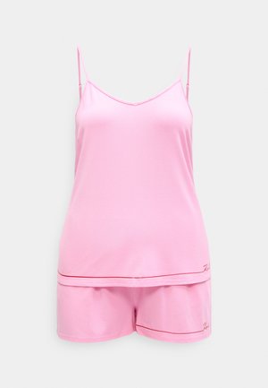 Σετ ροζ πυτζάμες με τοπ τύπου καμισόλ με λεπτές τιράντες και άνετη εφαρμογή, συνοδευόμενο από σορτς σετ με κόκκινο περίγραμμα.
