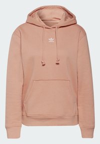 Rosa huva-sweatshirt gjort av mjukt tyg, med en framficka och en vit Adidas-logotyp på bröstet. Dra snören med tofsar.