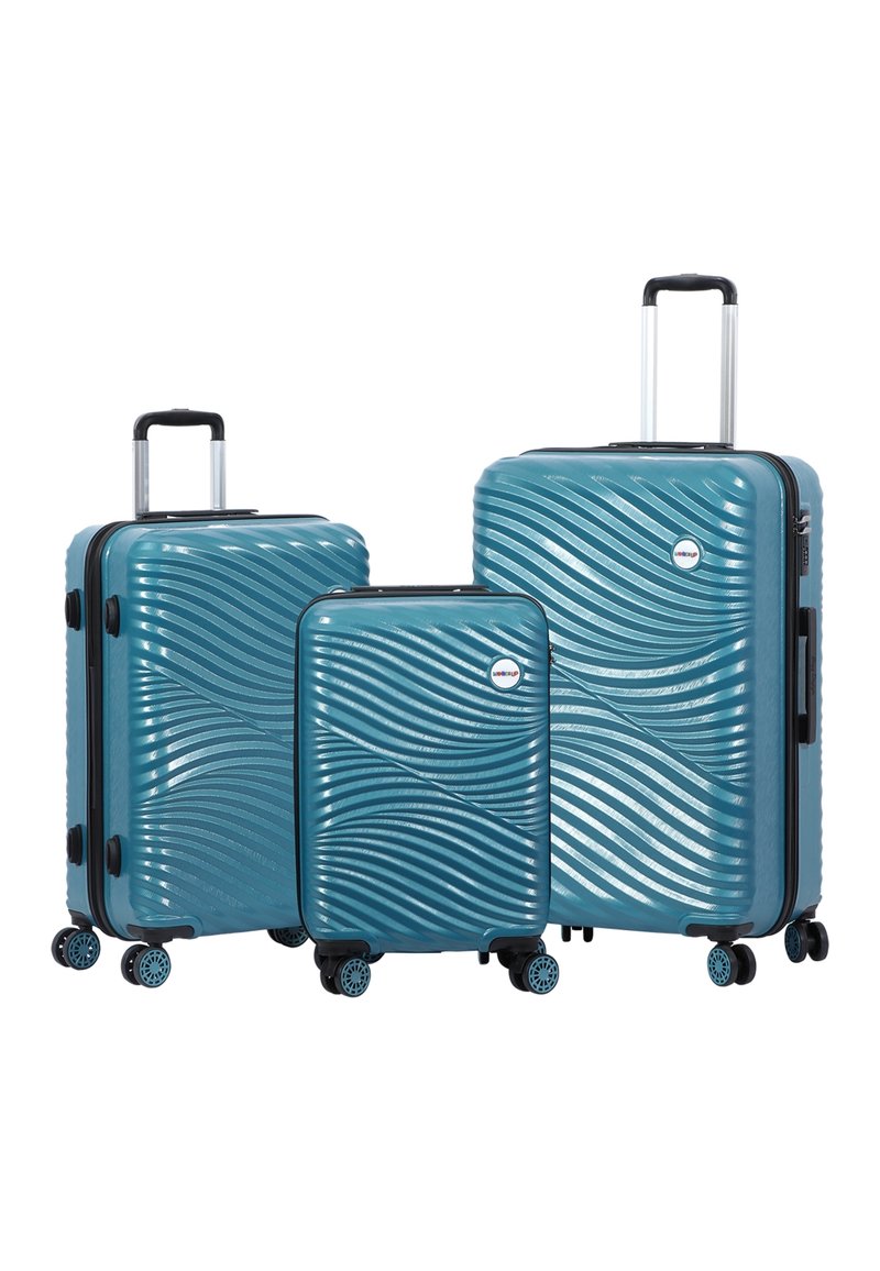 Three teal hard-shell suitcases with wavy textured patterns, telescopic handles, and four spinner wheels, arranged by size.