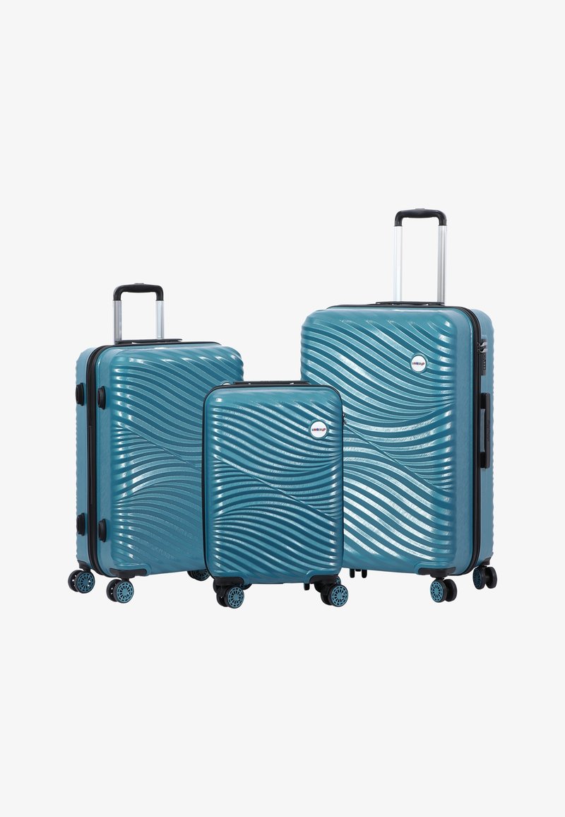 Three teal hard-shell suitcases with wavy textured patterns, telescopic handles, and four spinner wheels, arranged by size.
