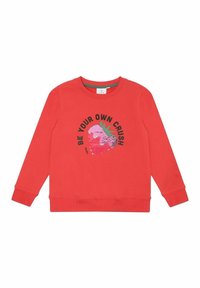 Röd sweatshirt med rund hals och långa ärmar. Har en paljettjordgubbe-design med texten "VAR DIN EGEN KÄRLEK" i fet stil.