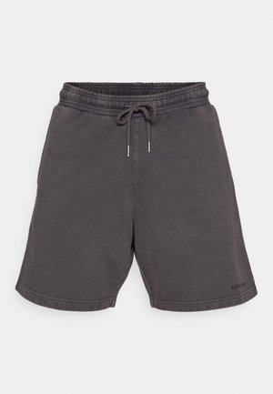 Dark gray sweat shorts featuring an elastic waistband with drawstring, side pockets, and a relaxed fit. Soft, textured fabric.