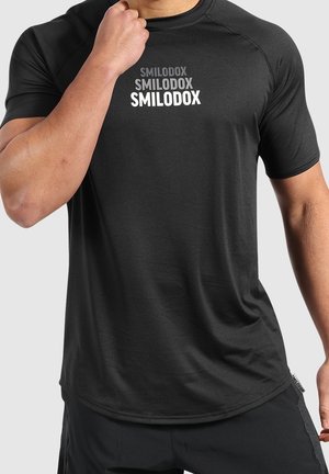 Tekninen t-paita - black