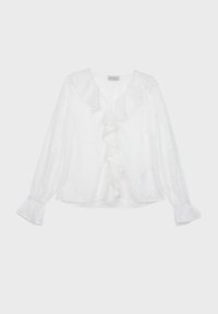 Hvit langermet bluse med teksturert blomsterdesign, volang foran og flared mansjetter. Mykt stoff med avslappet passform.