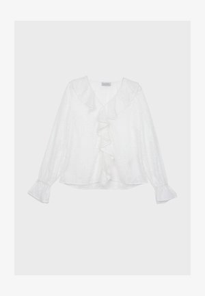 Vit långärmad blus med ett texturerat blommönster, volang framtill och utsvängda ärmar. Mjuk tygkvalitet med en avslappnad passform.