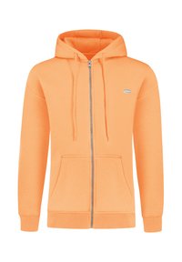 Oranje zip-up hoodie gemaakt van een zachte stof, met een trekkoordkap, voorzakken en een klein logo-accent op de borst.