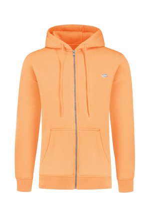 Orange zip-up hoodie made from a soft fabric, featuring a drawstring hood, front pockets, and a small logo accent on the chest.