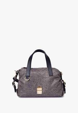 Small black and white patterned handbag with black handles, a gold clasp on front, and detachable shoulder strap with gold hardware.