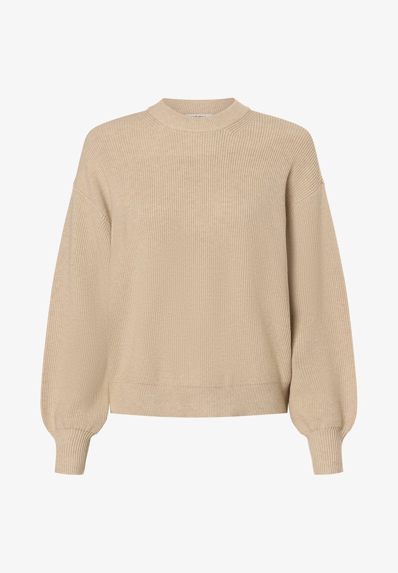 Pull en tricot beige avec un col haut et des épaules tombantes. Il présente une texture côtelée et des manches longues légèrement bouffantes.