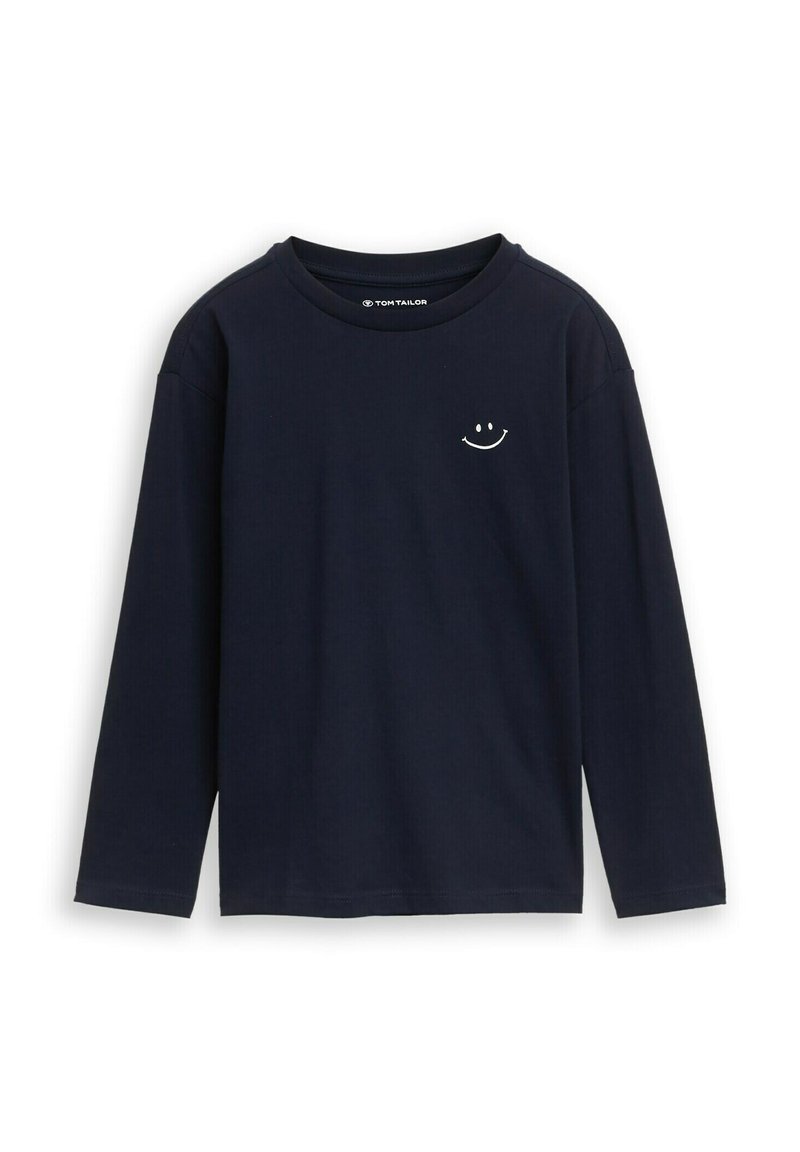 Marineblaues Langarmshirt aus weichem Baumwollstoff. Mit einem kleinen weißen Smiley-Emblem auf der Brust. Klassischer Rundhalsausschnitt.