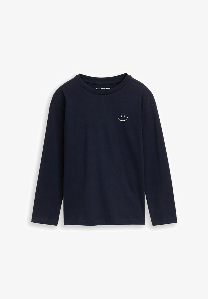 Marineblaues Langarmshirt aus weichem Baumwollstoff. Mit einem kleinen weißen Smiley-Emblem auf der Brust. Klassischer Rundhalsausschnitt.