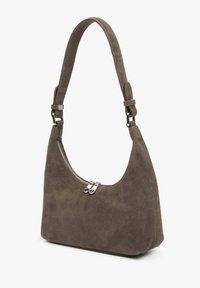 Brown suede handbag with short adjustable strap and silver double zipper closure on white background.