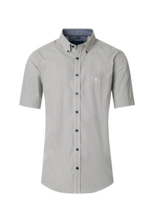 Short-sleeve, button-up shirt in white with blue geometric patterns, featuring a chest pocket and blue buttons along the front.
