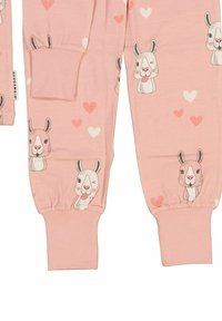 Pink children's pajamas made of soft fabric, featuring cartoon llamas and heart patterns. Elastic cuffs provide a snug fit.