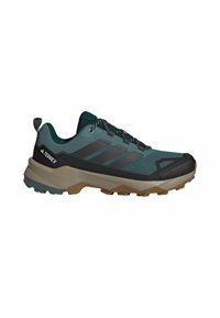 Turkusowe buty trekkingowe z czarnymi akcentami, teksturowana powierzchnia, mocna podeszwa i sznurowany design. Posiadają logo i rowkowaną gumową podeszwę.