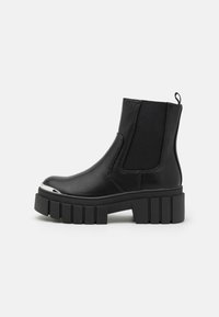 Bottines à plateau - black