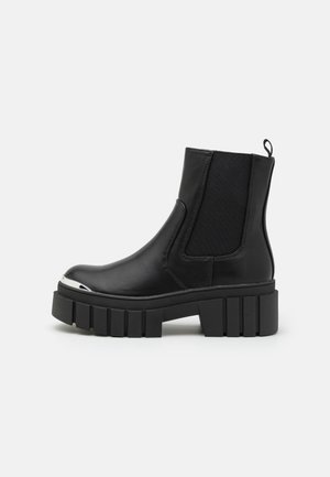Bottines à plateau - black