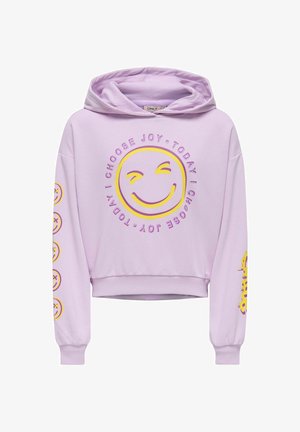 Svetle fialová zkrácená mikina z bavlny. Má centrální grafiku žlutého usměvavého obličeje s textem "DNEŠKA VOLÍM RADOST" a usměvavé obličeje na rukávech.