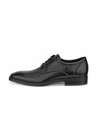 Schwarze Lederschuhe mit rundem Zeh, glatter Oberfläche, Schnürdesign und niedrigem, gestapeltem Absatz. Verfügt über subtile Nähte.
