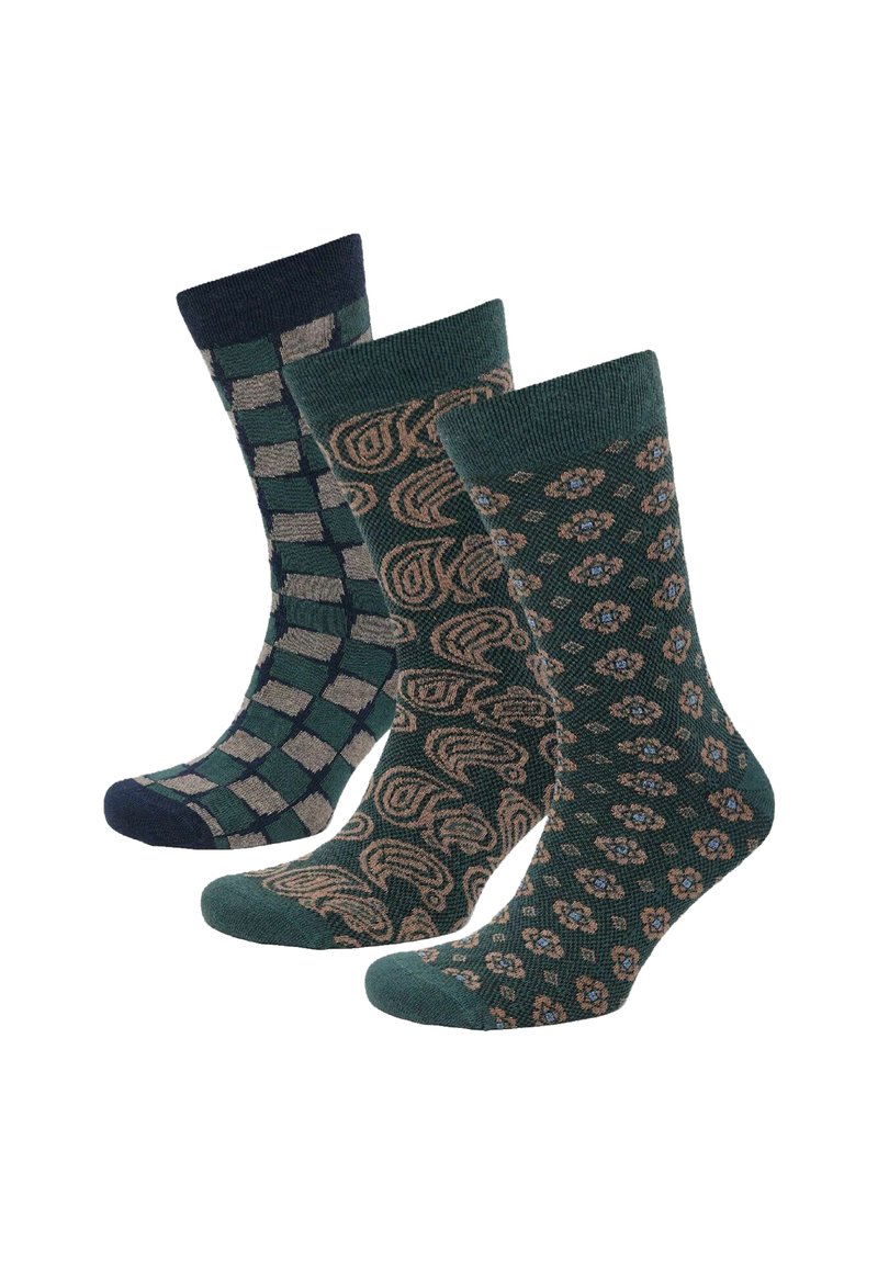 Drei Paar Socken in Dunkelgrün mit unterschiedlichen Mustern: einem karierten Design, einem spiralförmigen Motiv und einem floralen Muster, alle mit gerippten Bündchen.