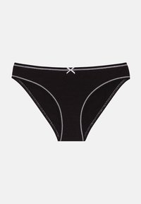 Black cotton brief with white stitching accents and a small white bow detail at the waist. Designed with a classic cut and soft texture.