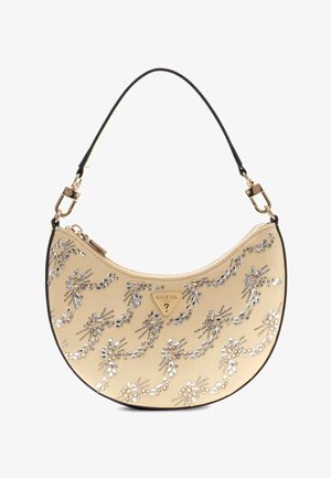 Bolso beige en forma de media luna con asa negra, decorado con motivos florales en pedrería plateada y transparente, con placa del logo de Guess.