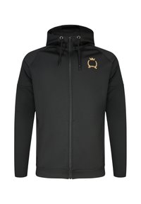 Sweat à capuche noir zippé avec cordons et un petit blason doré brodé sur le côté gauche de la poitrine.
