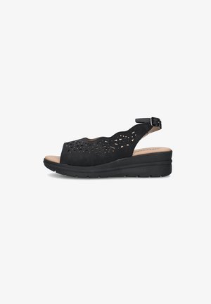 Sandalo zeppa nero con punta aperta, motivo traforato al laser, cinturino alla caviglia con fibbia e suola imbottita per un comfort extra.