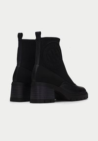 Hispanitas EVEREST - Enkellaarsjes met plateauzool - black