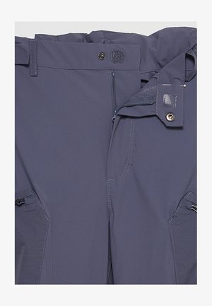 Navyblue'owe spodnie outdoorowe z zamkiem błyskawicznym, zapięciem na guzik i regulowanym paskiem w talii. Zawierają kieszenie boczne z zamkami błyskawicznymi oraz wzmocnione szwy.