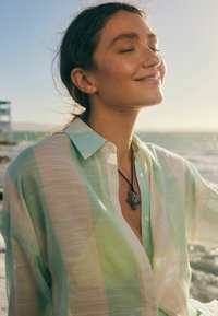 Next COVER-UP REGULAR FIT - Dodaci za plažu - mint green