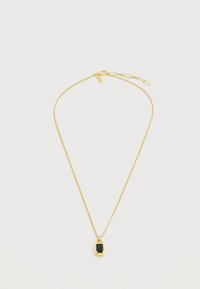 Χρυσό κολιέ με αλυσίδα και ορθογώνιο μαύρο πέτρινο μενταγιόν, με ρυθμιζόμενο κούμπωμα σε λευκό φόντο.