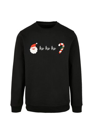 Schwarzer Sweatshirt mit einem festlichen Design, das einen Santa-Hut, einen Bart, die Phrase "ho ho ho" und eine Grafik eines gestreiften Zuckerstäbchens zeigt.