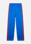 FIREBIRD TRACK PANTS-JUNIOR UNISEX - Pantalon de survêtement - blue/semi lucid red