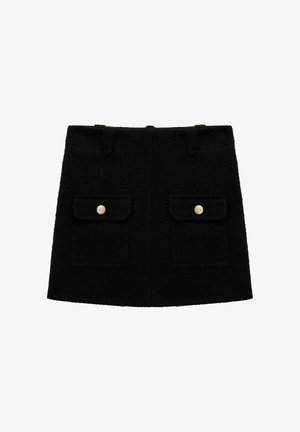 Mini-jupe en tweed noir avec deux poches avant à boutons dorés, forme rectangulaire, tissu texturé et passants pour ceinture.
