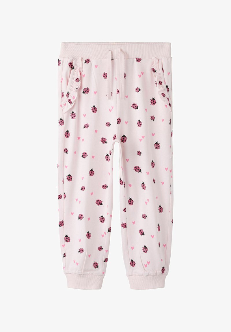 Pantalon pour tout-petit rose clair avec poignets élastiques, taille à cordon, poches latérales volantées, imprimé de petites coccinelles roses et de cœurs.