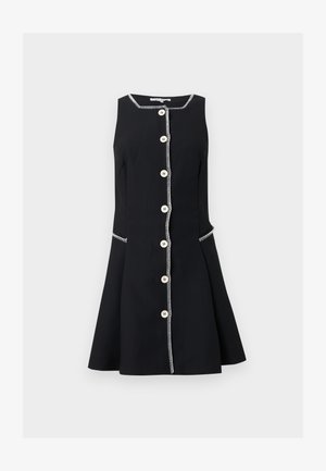 Μαύρο αμάνικο φόρεμα με λευκή ζιγκ-ζαγκ λεπτομέρεια και κουμπιά στο μπροστινό μέρος, με φουσκωτή φούστα και διακοσμητικές ραφές στο πλάι.